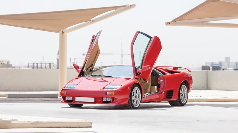 Red Sports Car — Calm, Afternoon, Photograph, Car Door, Awning