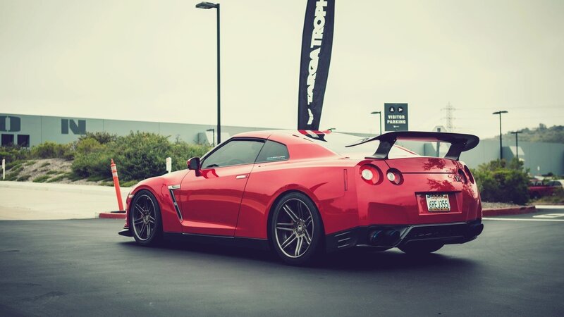 Red Sports Car — Calm, Afternoon, Photograph, Flag