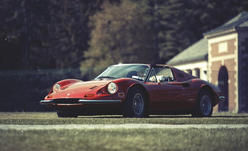 Red Sports Car — Calm, Afternoon, Photograph, Grass, Building