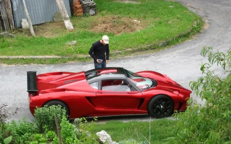 Red Sports Car — Calm, Afternoon, Photograph, Man