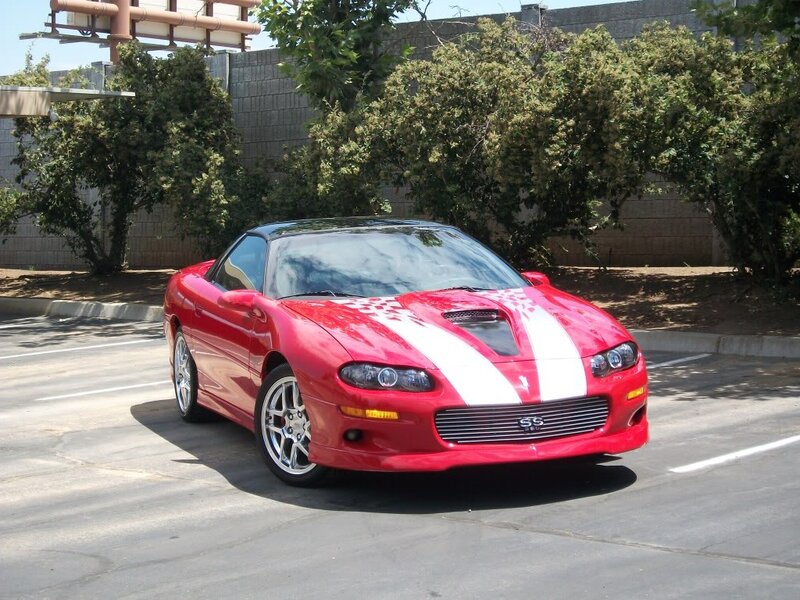 Red Sports Car — Calm, Afternoon, Photograph, Trees, Building
