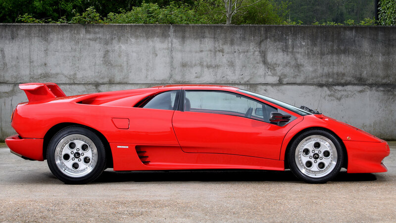 Red Sports Car — Calm, Photograph, Concrete Wall