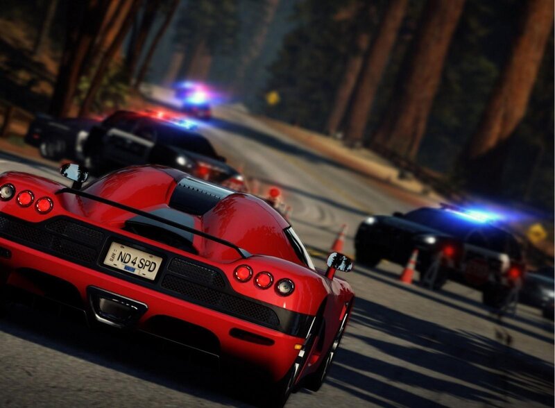 Red sports car chase in forest