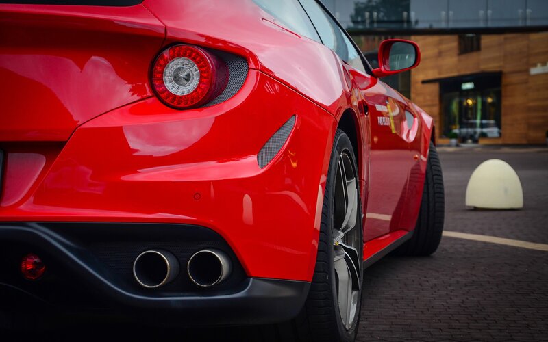 Red Sports Car — Dramatic, Afternoon, Photograph, Building, Bollard