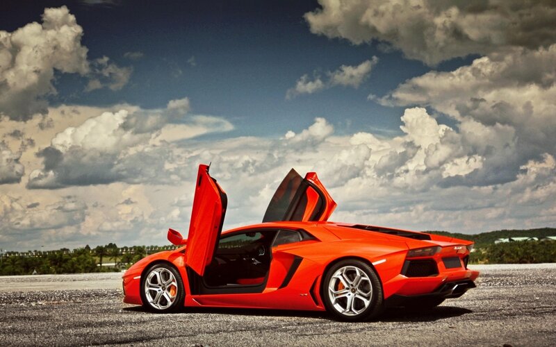 Red Sports Car — Dramatic, Afternoon, Photograph, Car Door, Clouds
