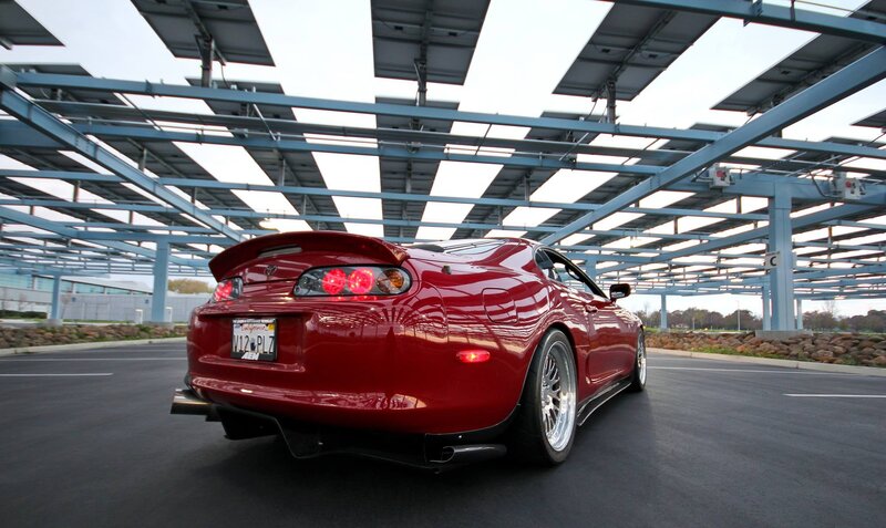 Red Sports Car — Dramatic, Afternoon, Photograph, Solar Panels