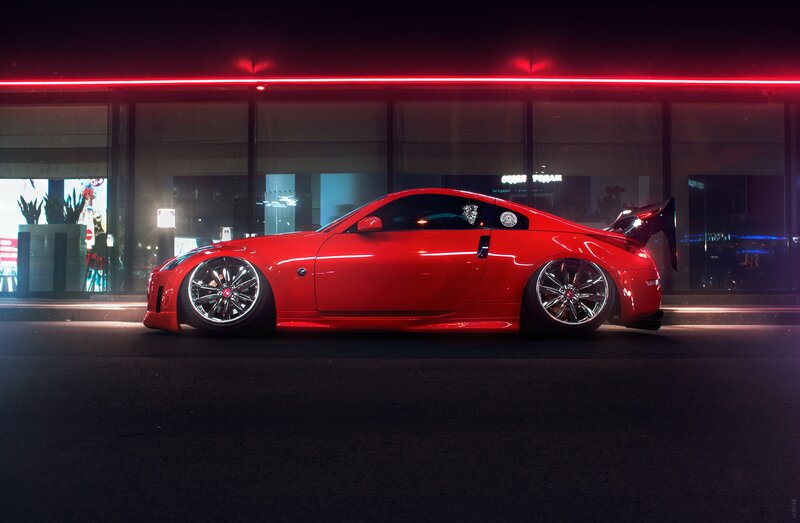 Red Sports Car — Dramatic, Night, Photograph, Building, Neon Lights