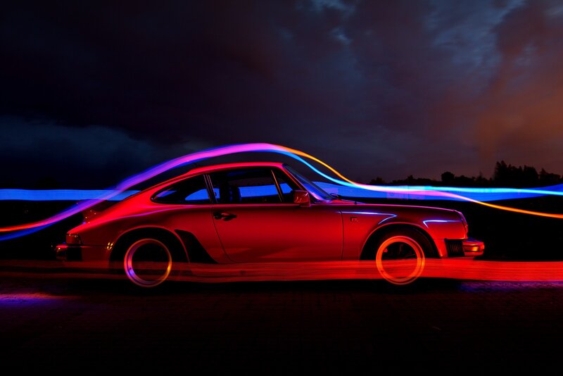 Red Sports Car — Dramatic, Night, Photograph, Light Trails