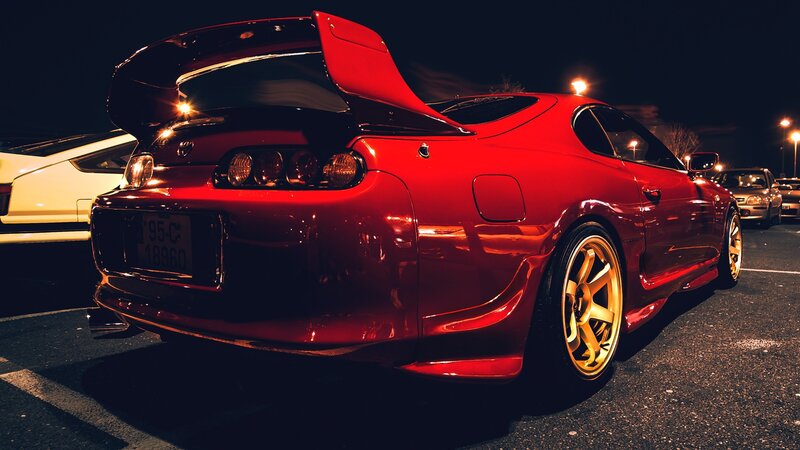 Red Sports Car — Dramatic, Night, Photograph, Parking Lot, Tail Light