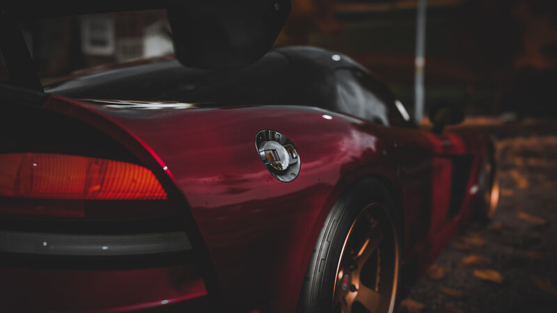 Red Sports Car — Dramatic, Night, Photograph, Tire, Leaves