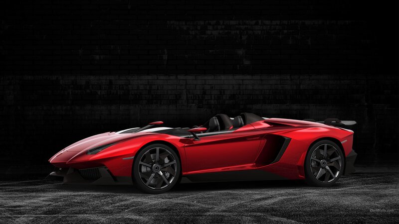 Red Sports Car — Dramatic, Photograph, Brick Wall, Black Pavement