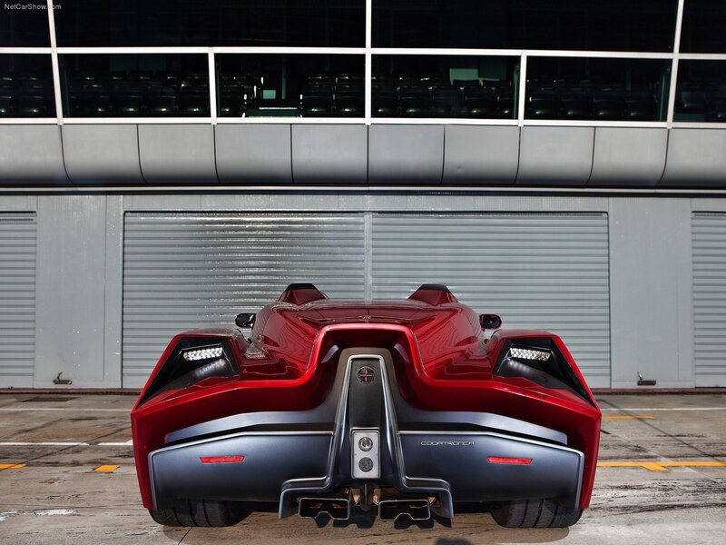 Red Sports Car — Dramatic, Photograph, Building, Garage Door