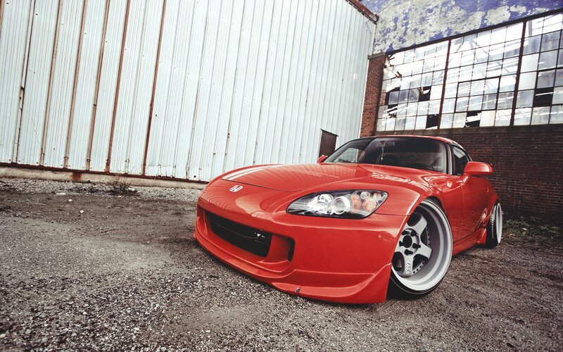 Red Sports Car — Dramatic, Photograph, Building, Gravel, Windows