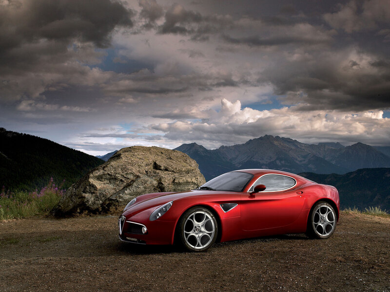 Red Sports Car — Dramatic, Photograph, Mountains, Rock, Clouds