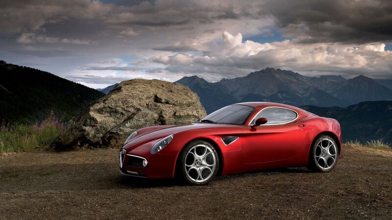 Red Sports Car — Dramatic, Photograph, Mountains, Rock
