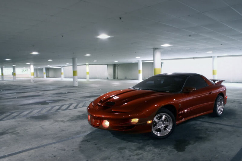 Red Sports Car — Dramatic, Photograph, Parking Garage, Concrete Floor