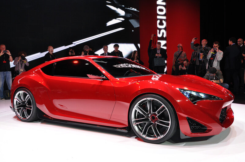 Red Sports Car — Dramatic, Photograph, People, Camera