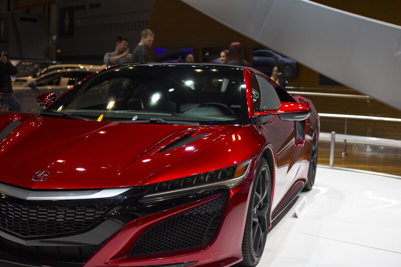 Red Sports Car — Dramatic, Photograph, People, Showroom