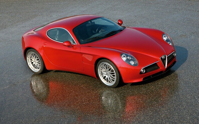 Red Sports Car — Dramatic, Photograph, Wet Pavement, Car Mirror