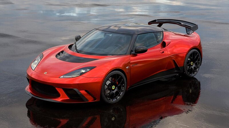 Red Sports Car — Dramatic, Photograph, Wet Pavement