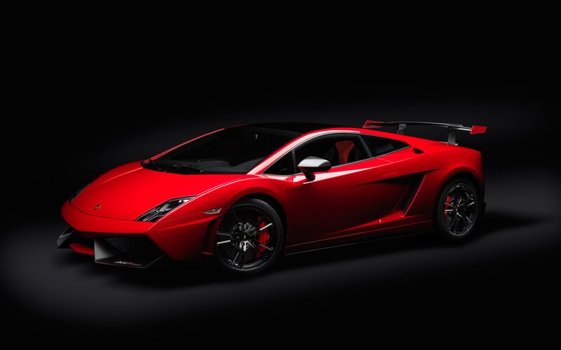Red Sports Car — Dramatic, Photograph, Wings, Black Wheels, Tinted Windows