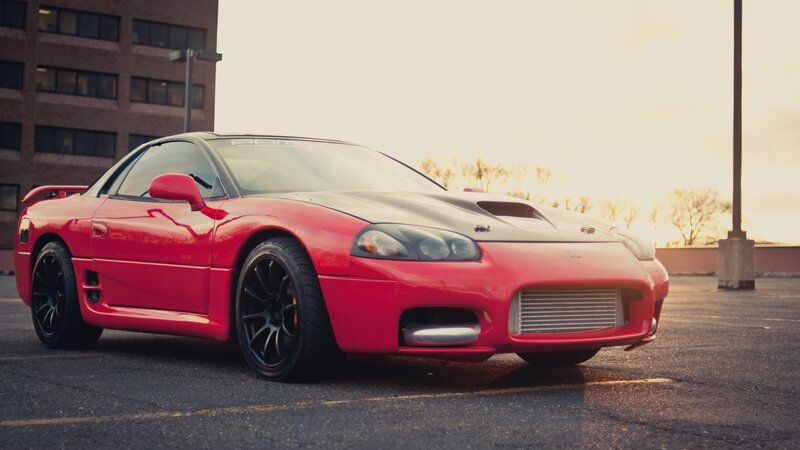 Red Sports Car — Dramatic, Sunset, Photograph, Building, Parking Lot, Trees