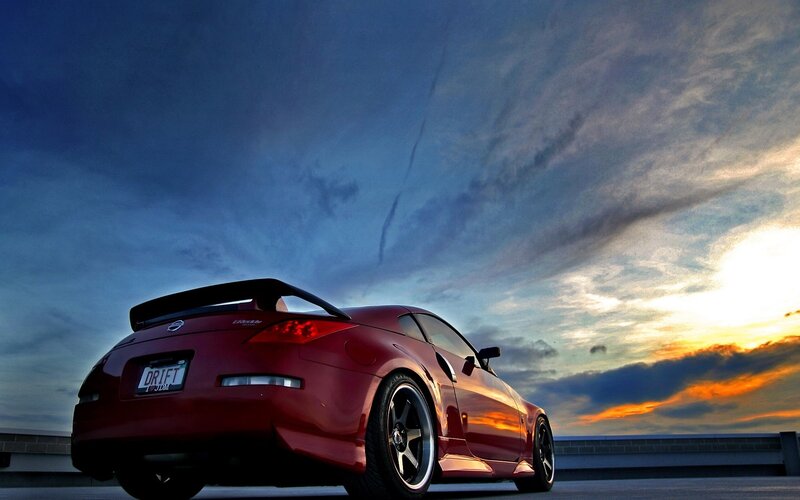 Red Sports Car — Dramatic, Sunset, Photograph, Sky, Clouds