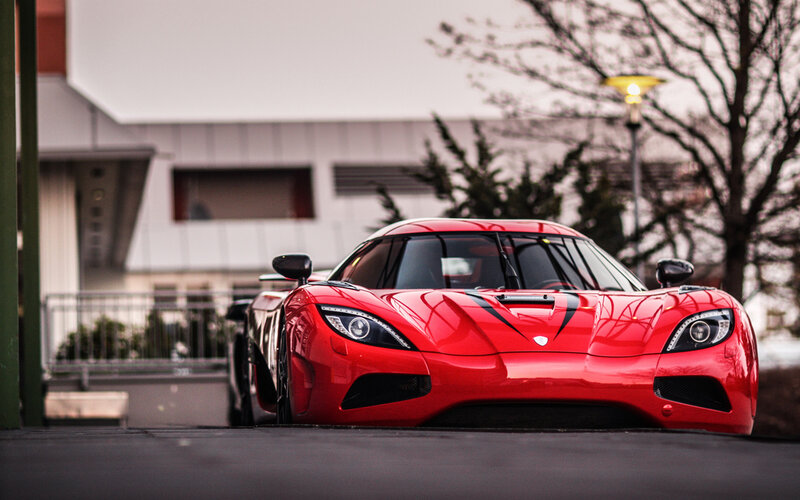 Red Sports Car — Dramatic, Winter, Photograph, Building