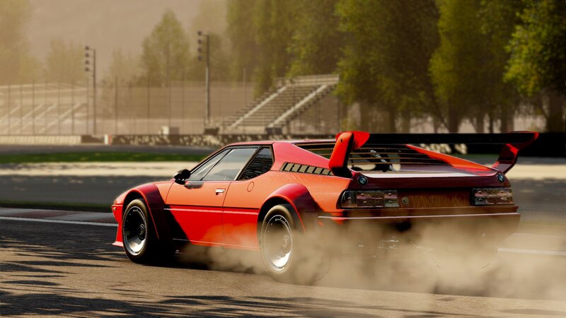 Red sports car drifting