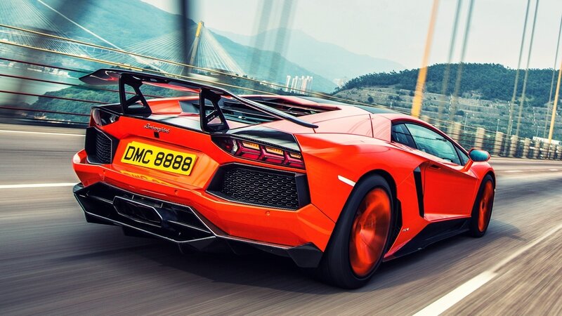 Red Sports Car — Dynamic, Afternoon, Photograph, Bridge, Mountains