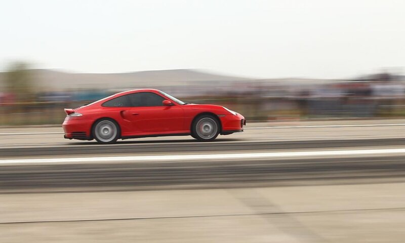 Red Sports Car — Dynamic, Afternoon, Photograph, Race Track, Crowd