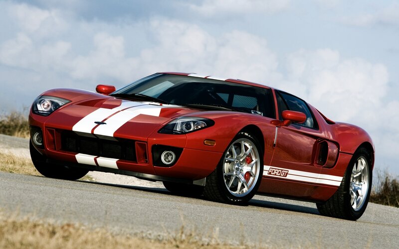 Red Sports Car — Dynamic, Afternoon, Photograph, Road, Sky, Grass
