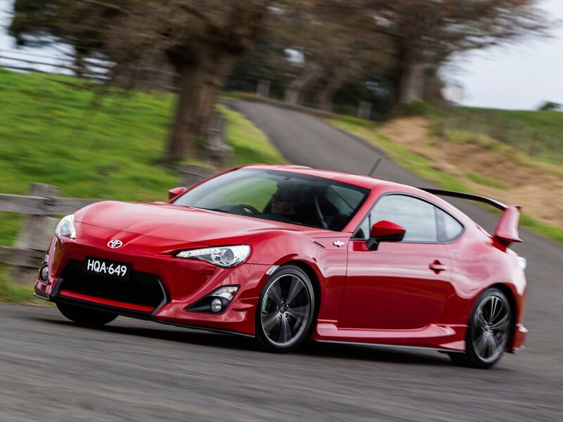 Red Sports Car — Dynamic, Afternoon, Photograph, Road, Trees, Fence, Black