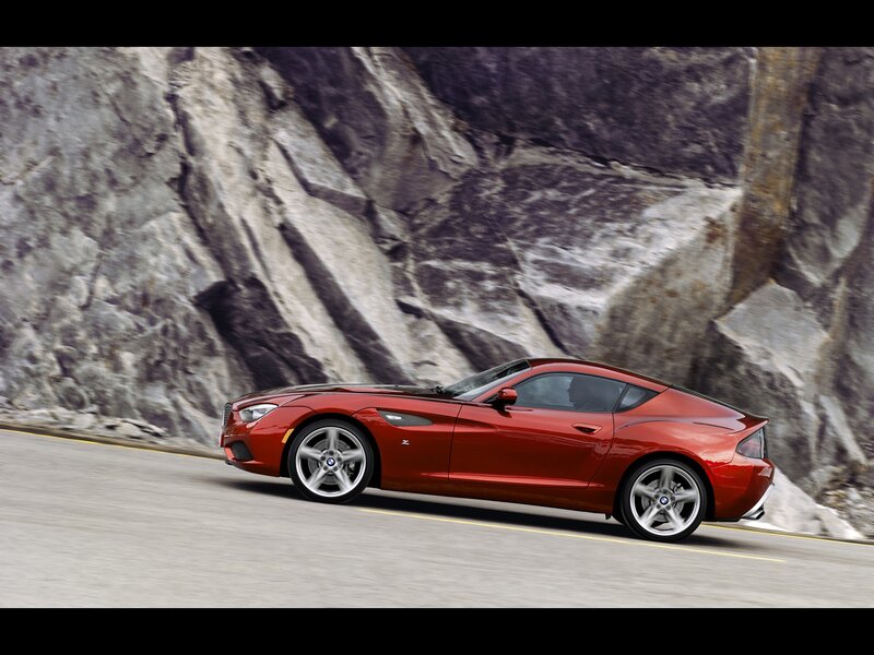 Red Sports Car — Dynamic, Photograph, Road, Rock Wall, Driver