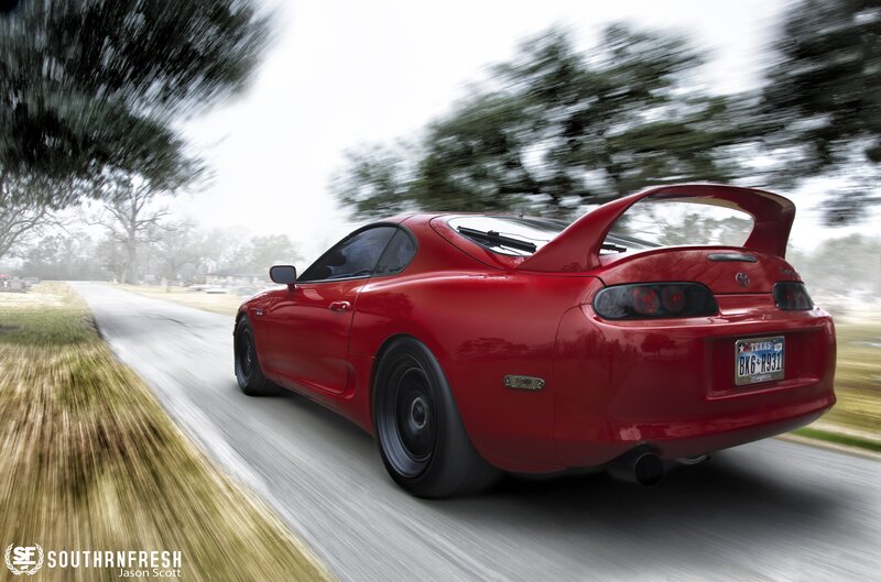Red Sports Car — Dynamic, Photograph, Road, Trees, Texas License Plate