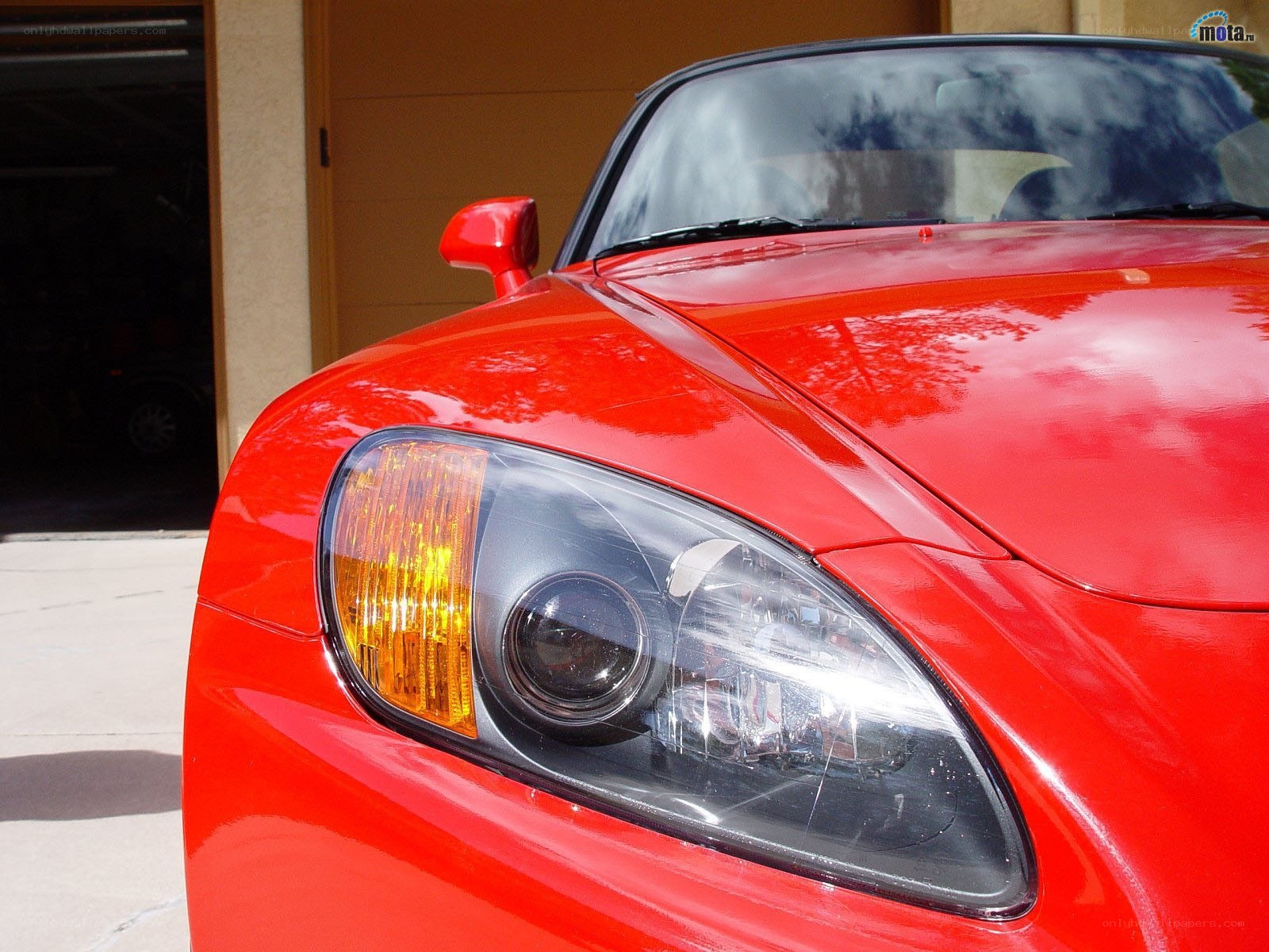red sports car headlight