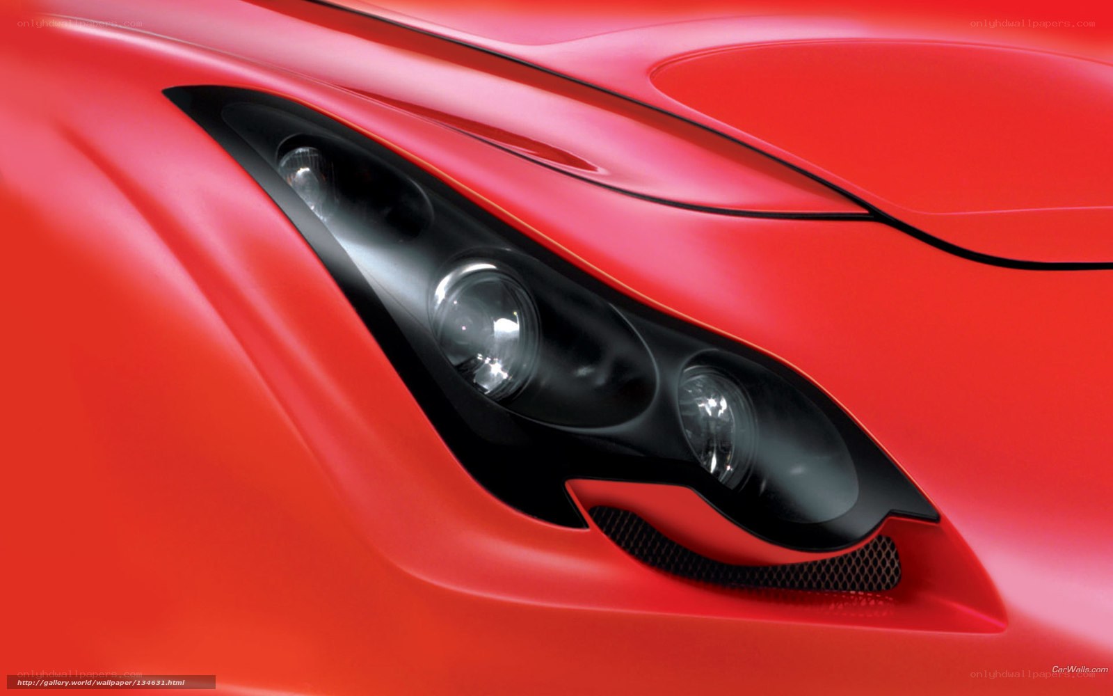 red sports car headlight