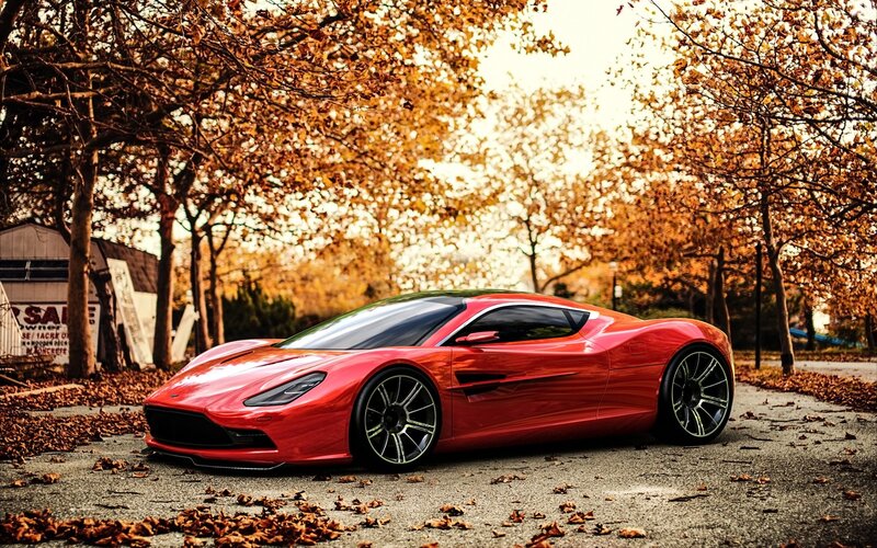 Red sports car in autumn