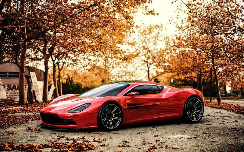 Red sports car in autumn