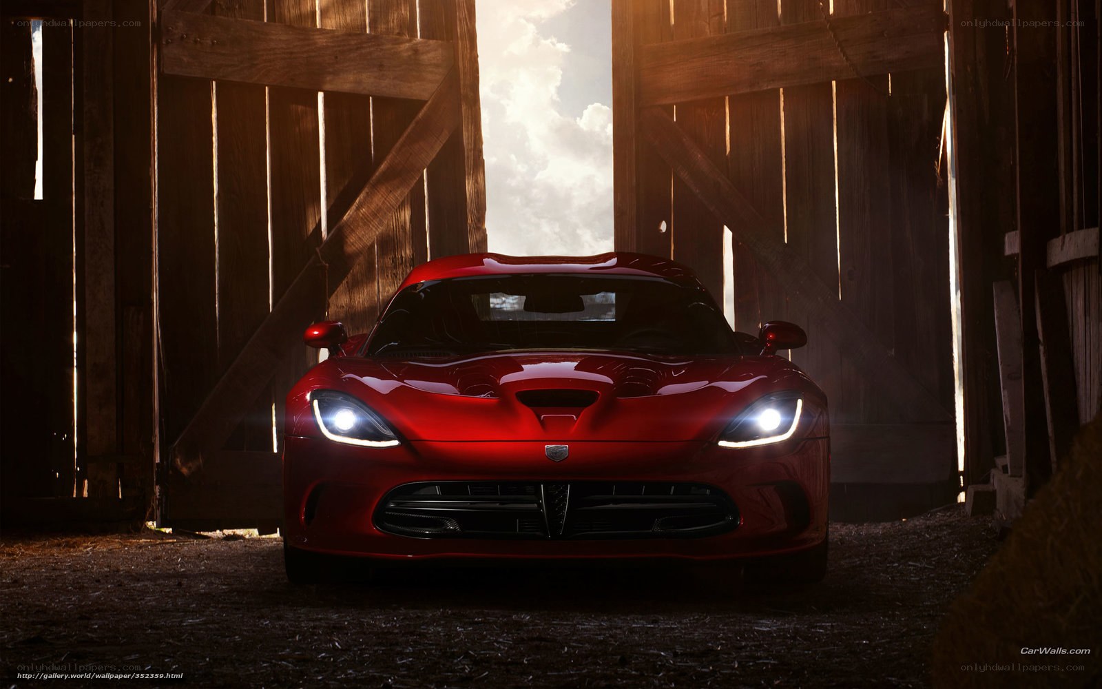 Red sports car in barn