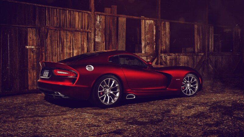 Red sports car in barn