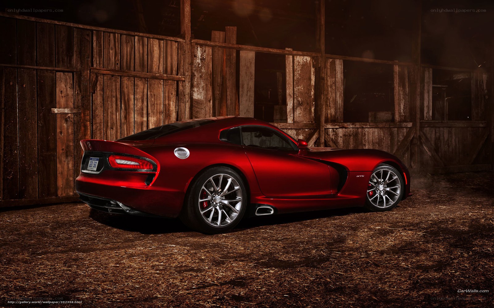 Red sports car in barn