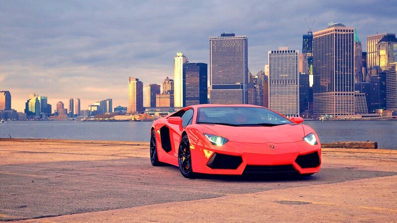 Red sports car in city