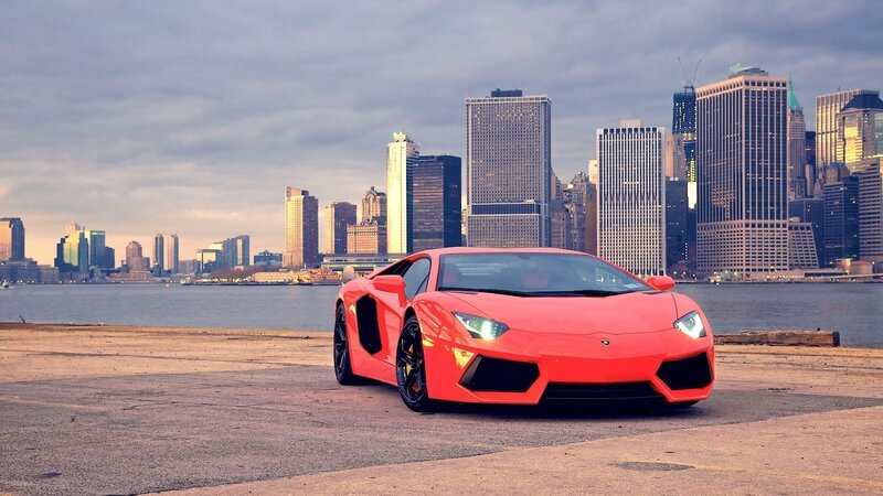 Red sports car in city