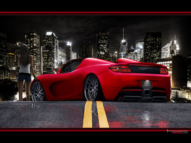 Red sports car in city at night