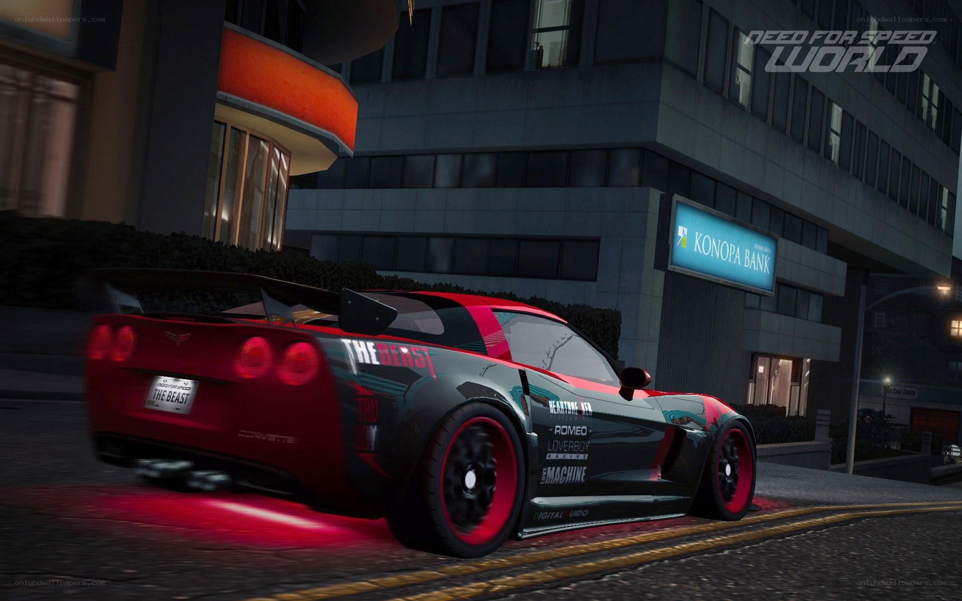red sports car in city