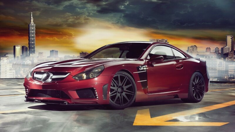 Red sports car in cityscape