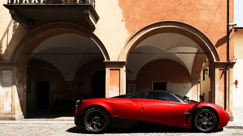 Red sports car in courtyard