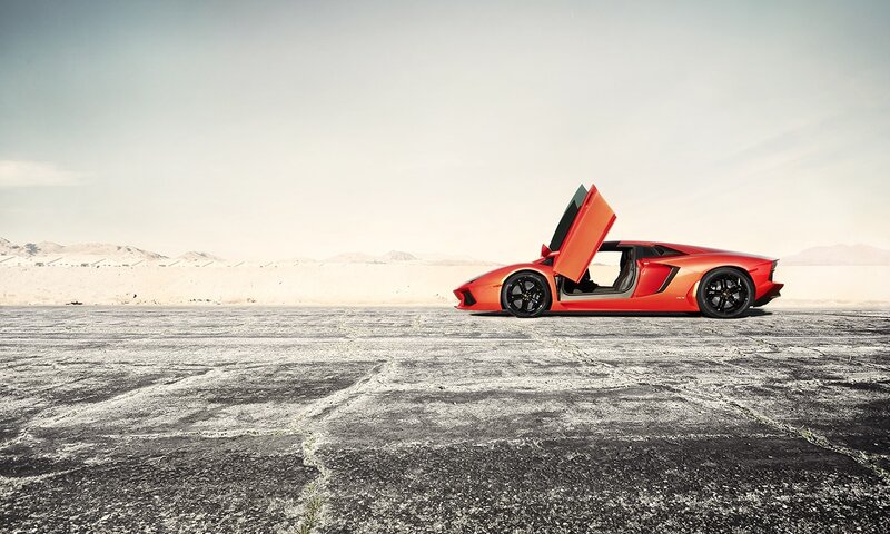 Red sports car in desert