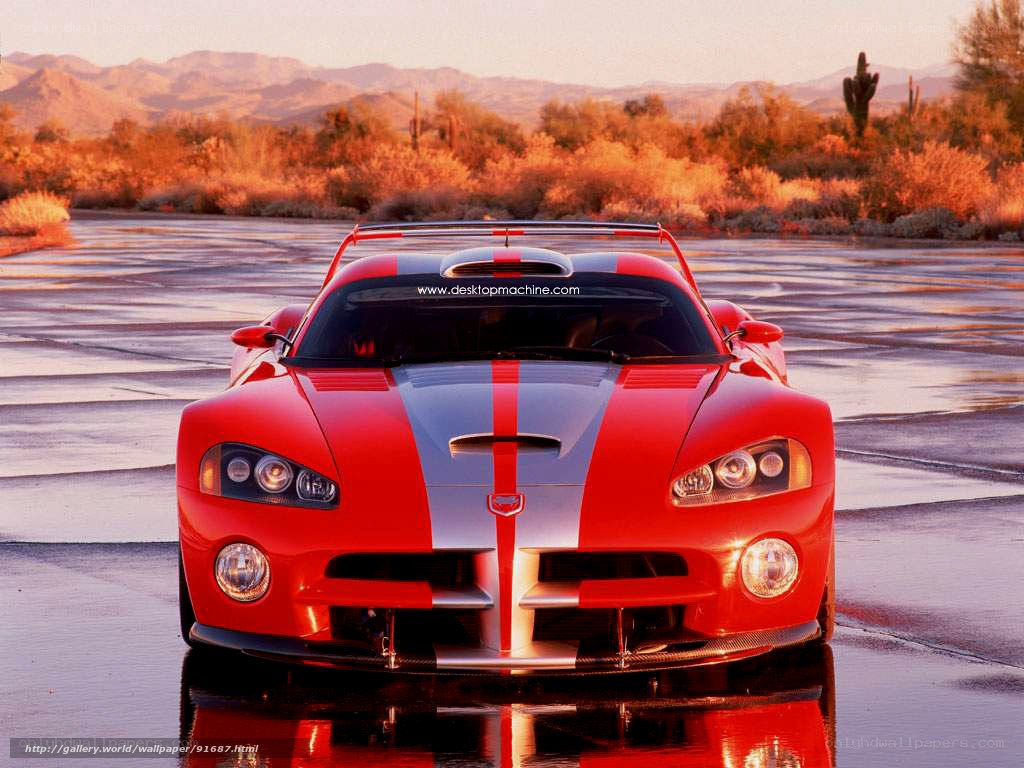 Red sports car in desert